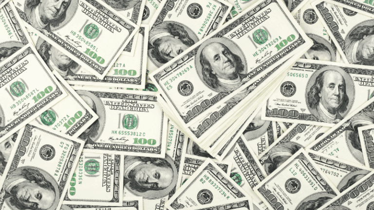 several 100 dollar bills