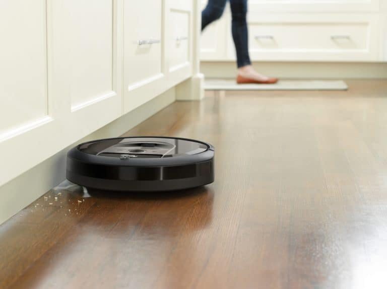 Roomba smart vacuum sweeping the floor