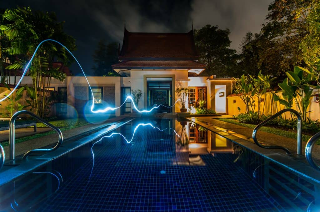 swimming pool with lightning striking