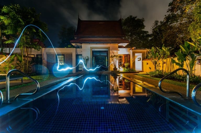 swimming pool with lightning striking
