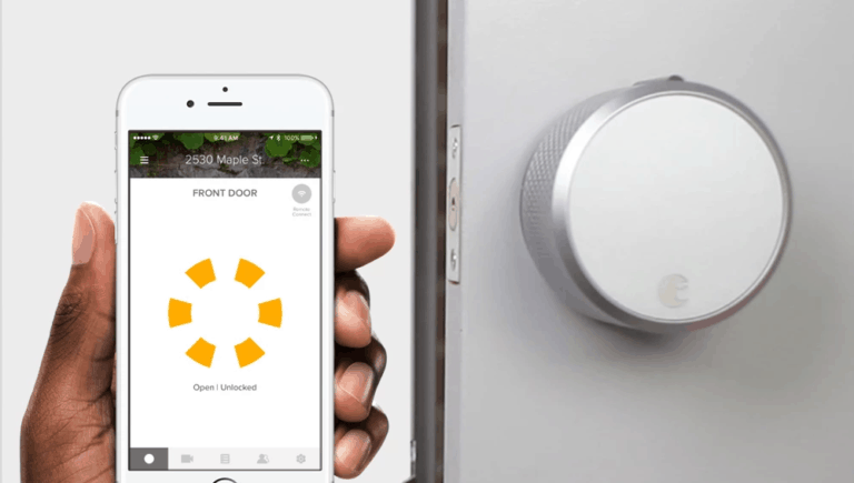 Person using smartphone with August smart lock.