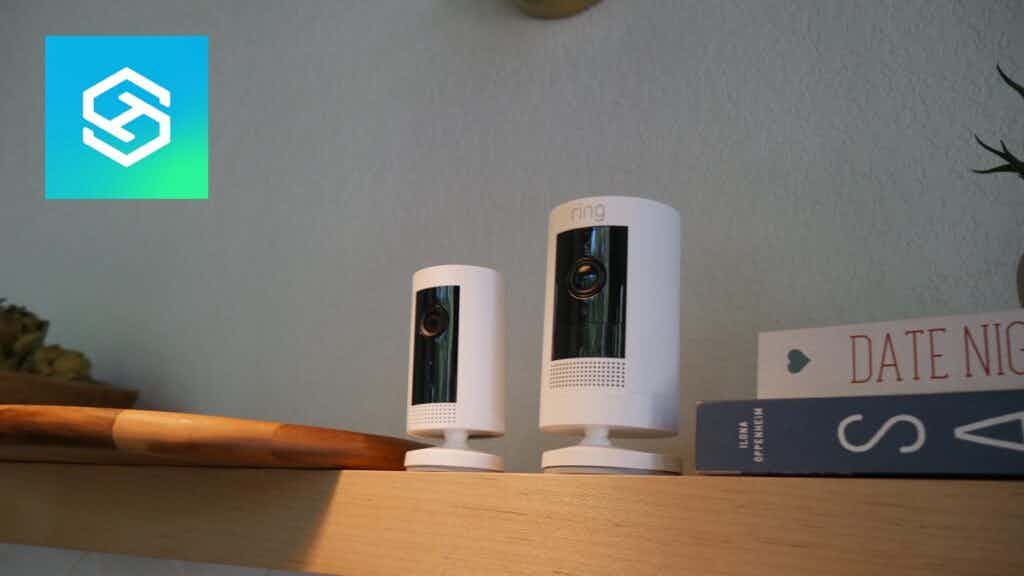 Two ring cameras on a shelf