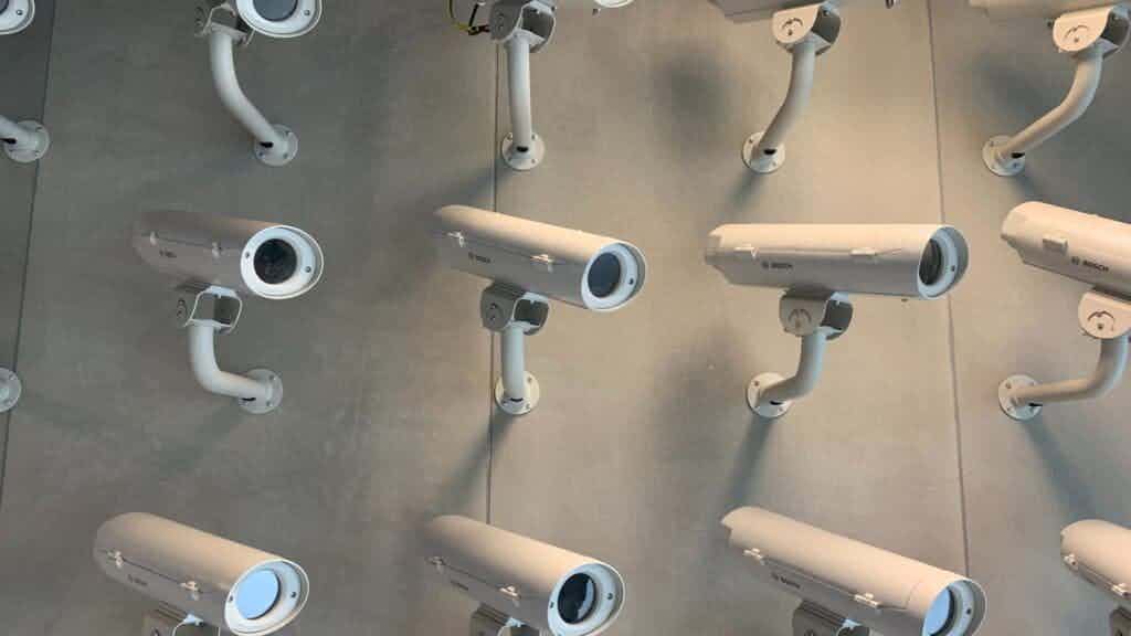 several security cameras on a wall