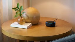 echo dot with blue light on a table