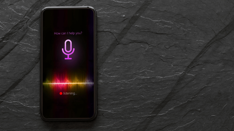 Iphone with Siri voice assistant on screen