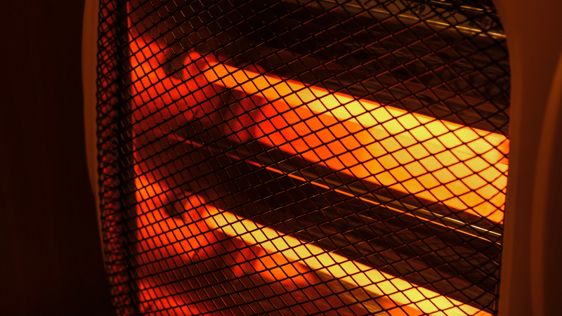 A glowing red heater.
