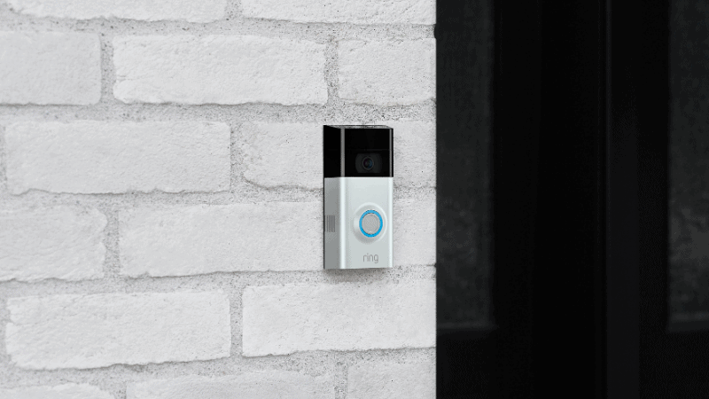 ring video doorbell 2 mounted to a brick wall