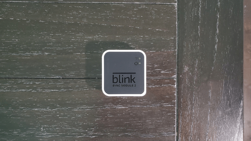 blink sync module 2 on a wood table