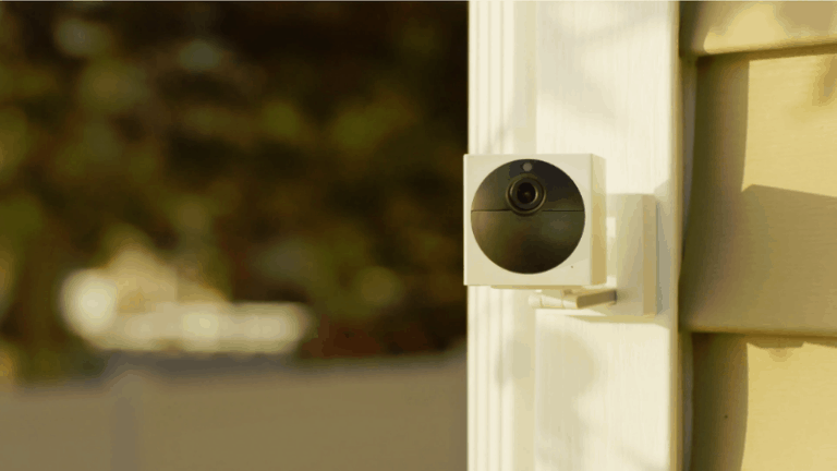 Wyze outdoor camera mounted to a home