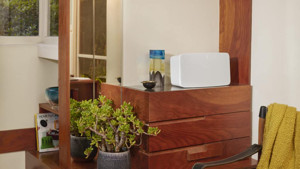 Sonos five speaker on a dresser.