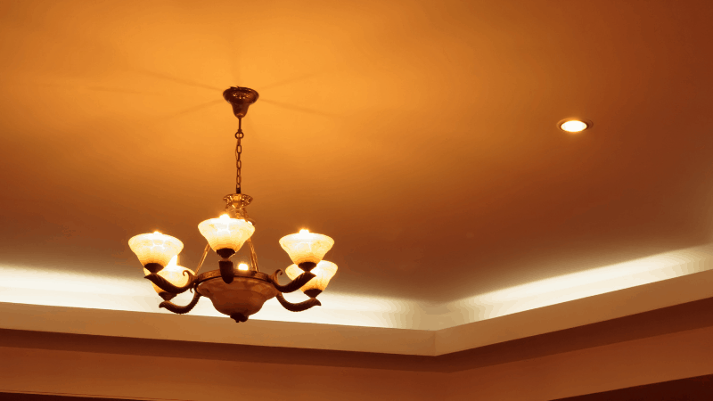 Ceiling light with lights on attached to ceiling. 