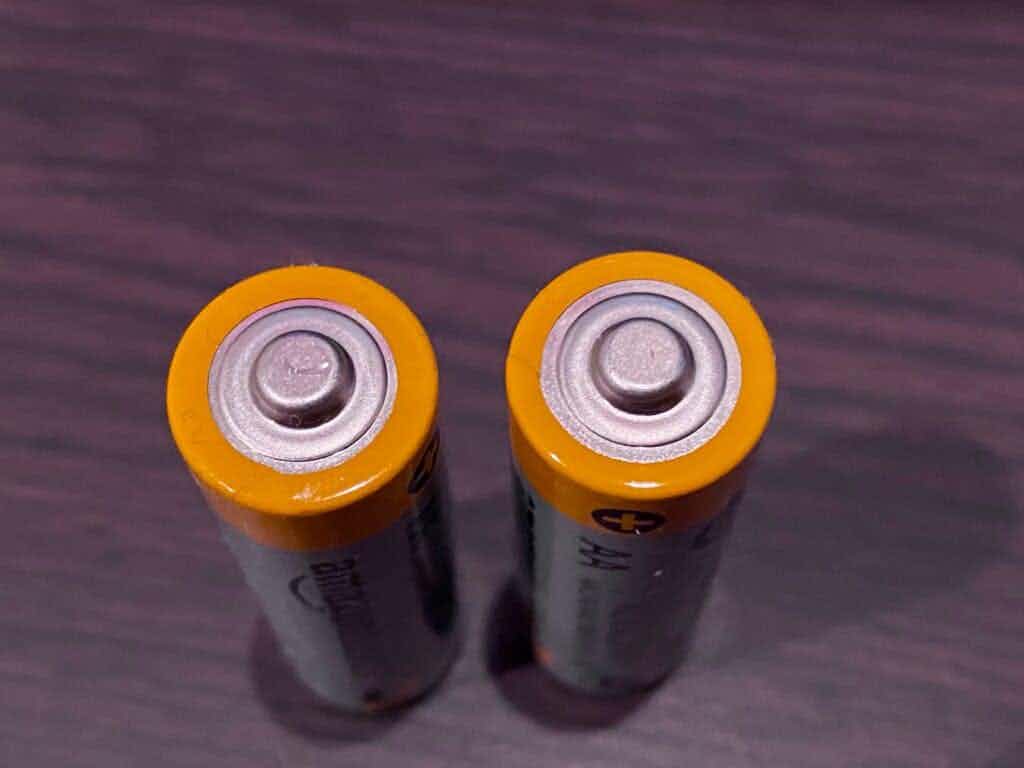 Two batteries on table.