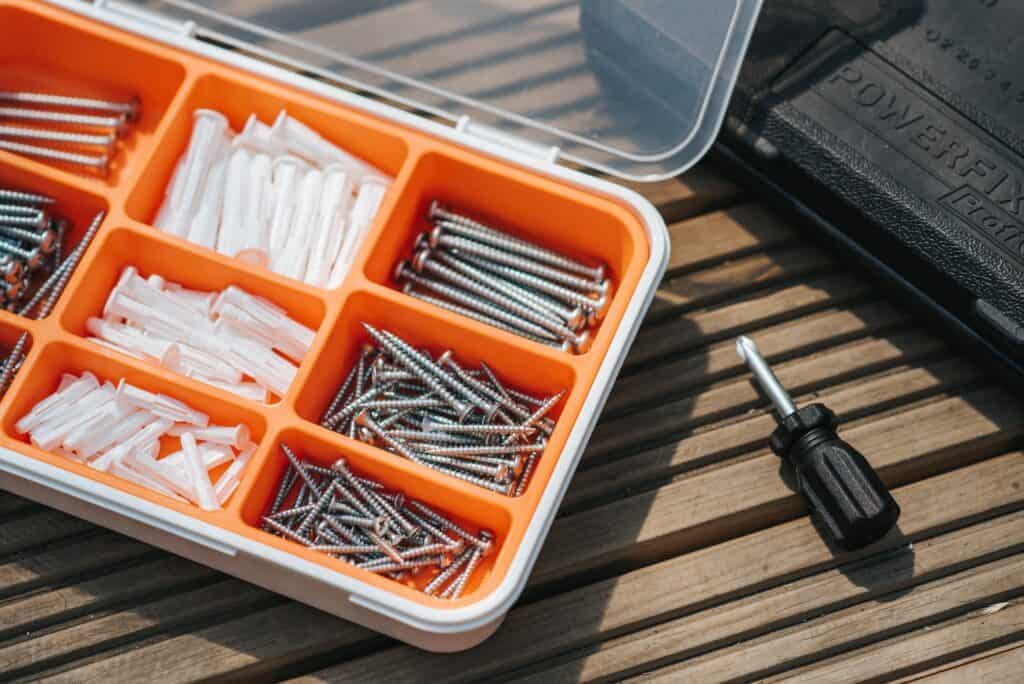 A box with an assortment of screws.