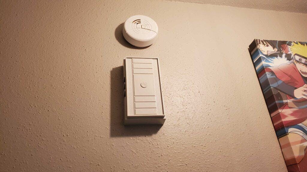 doorbell chime installed on a wall.