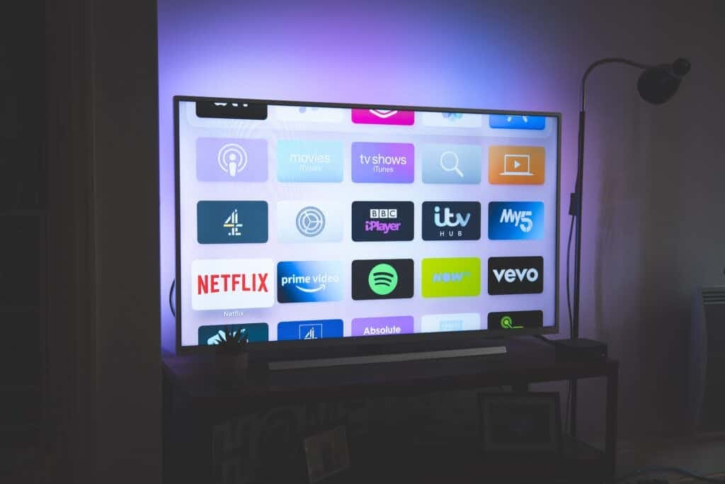 smart tv open with several apps in view