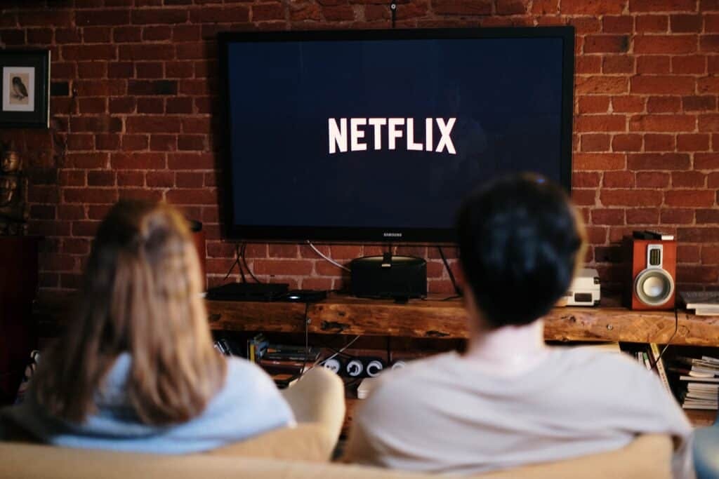 couple watching netflix on couch