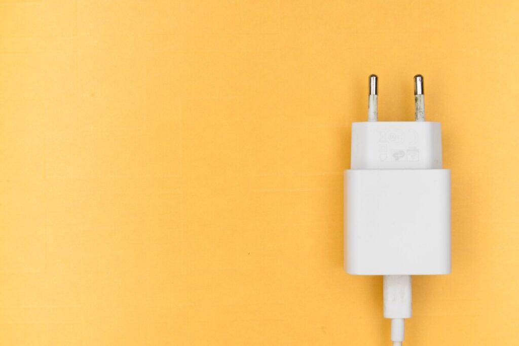 white power cord on yellow background