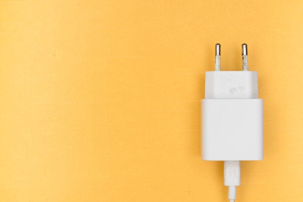 white power cord on yellow background