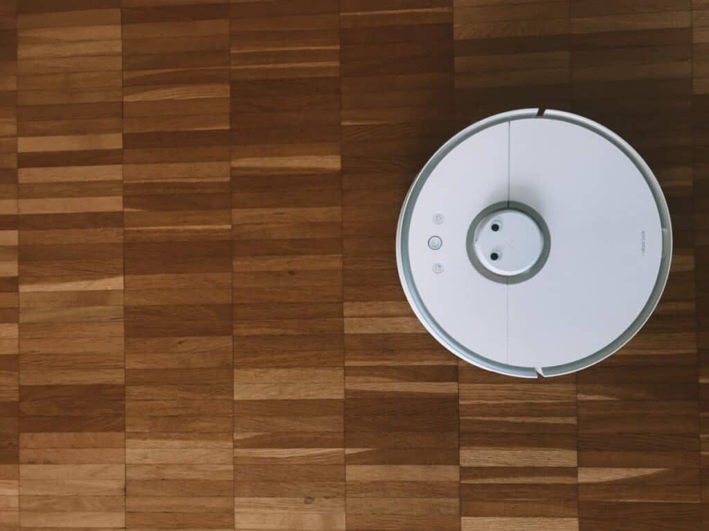 Roomba i7 vacuum on light wood floors