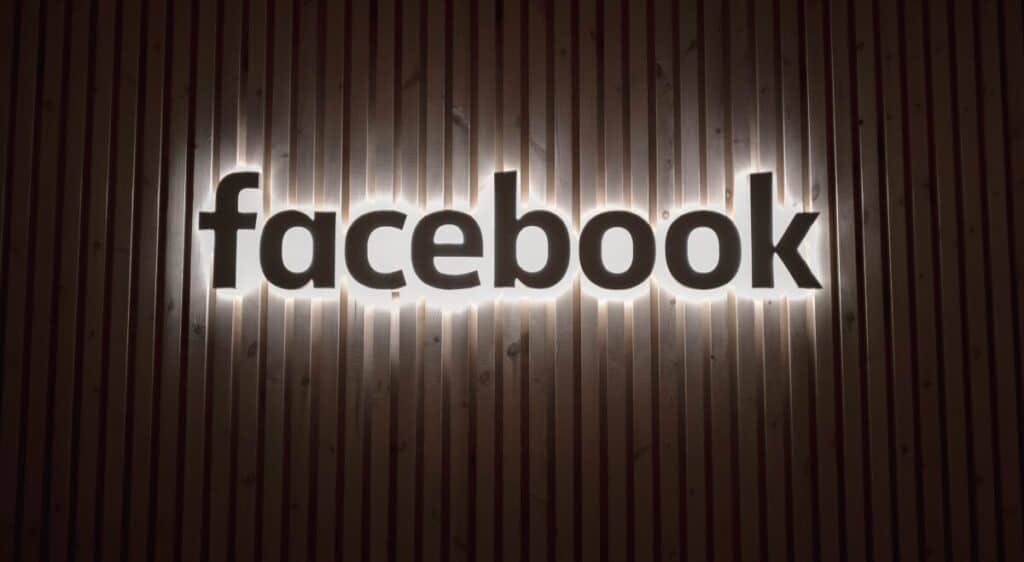 facebook logo with lights behind them