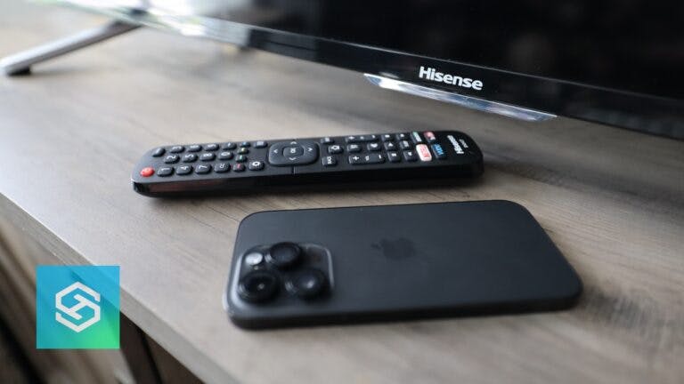 iphone next to Hisense tv