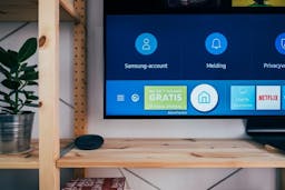 TV with Google Home to the side