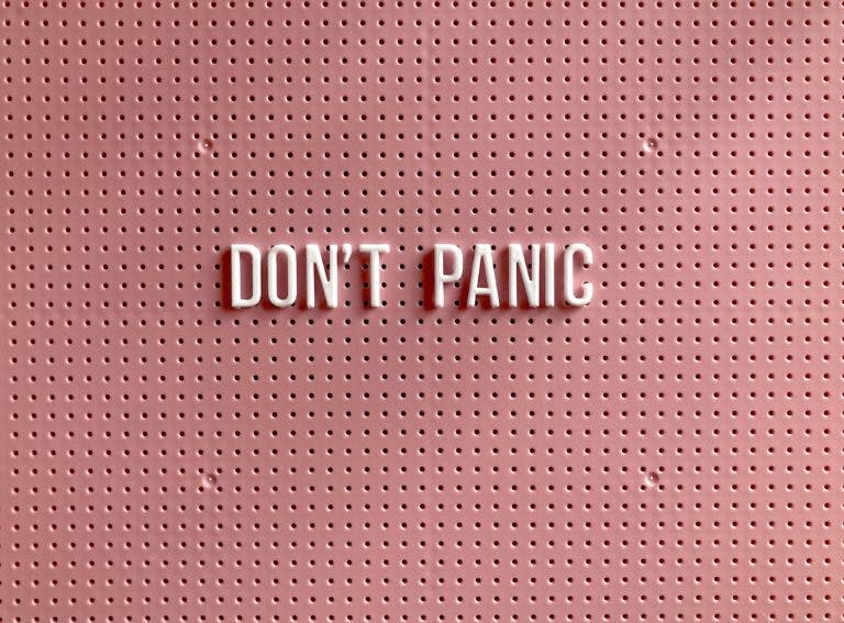don't panic pink sign