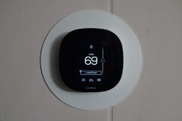 Ecobee thermostat on wall