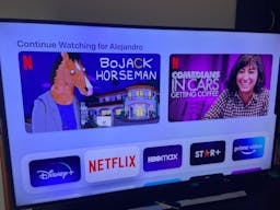 The home screen on Apple TV with Netflix logged in
