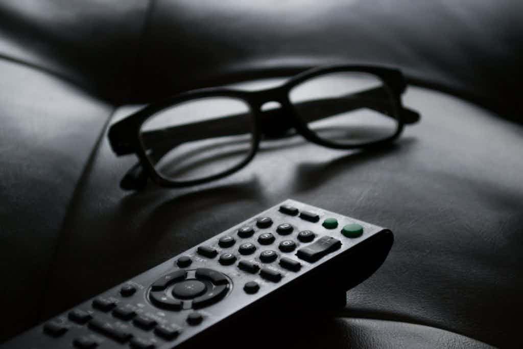 tv remote with glasses