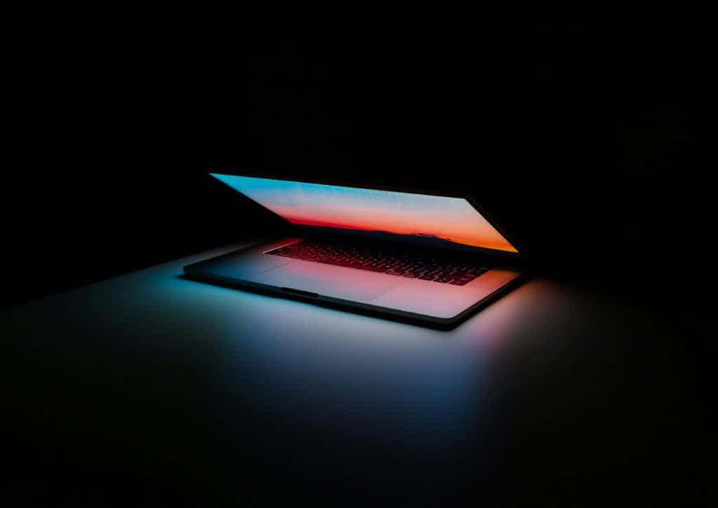 Laptop on black background