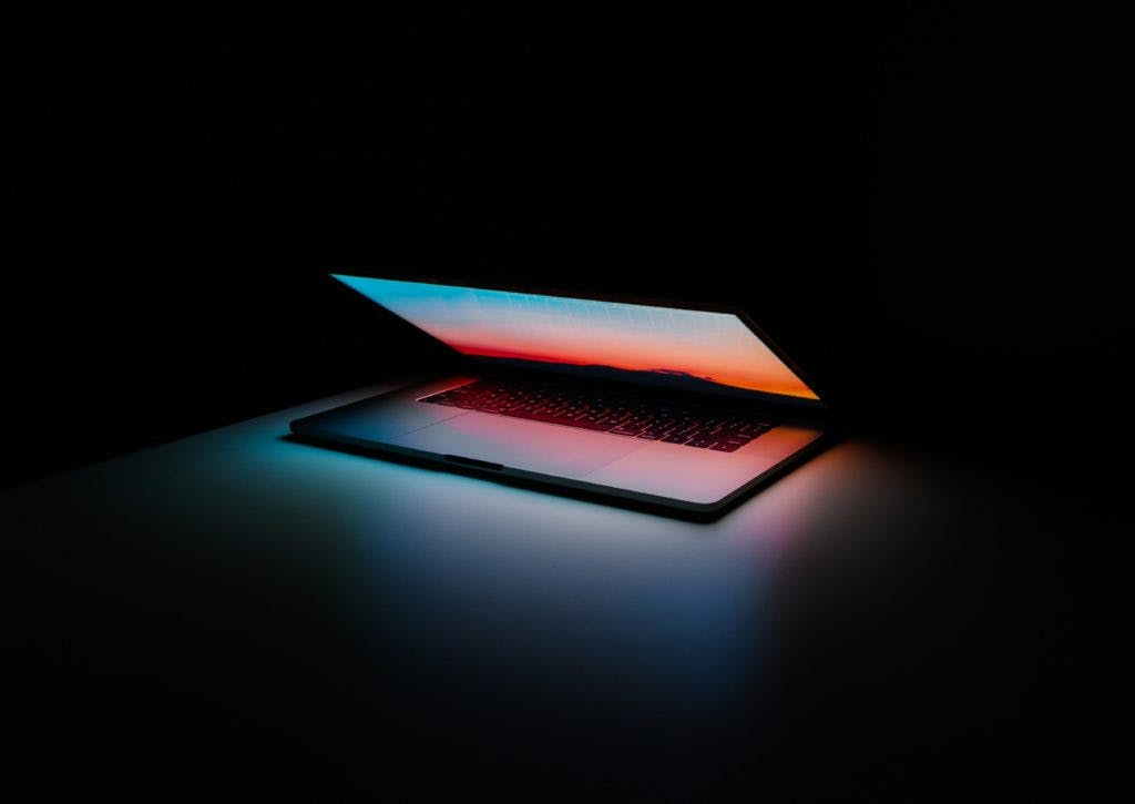 Laptop on black background