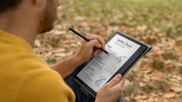 person using kindle scribe
