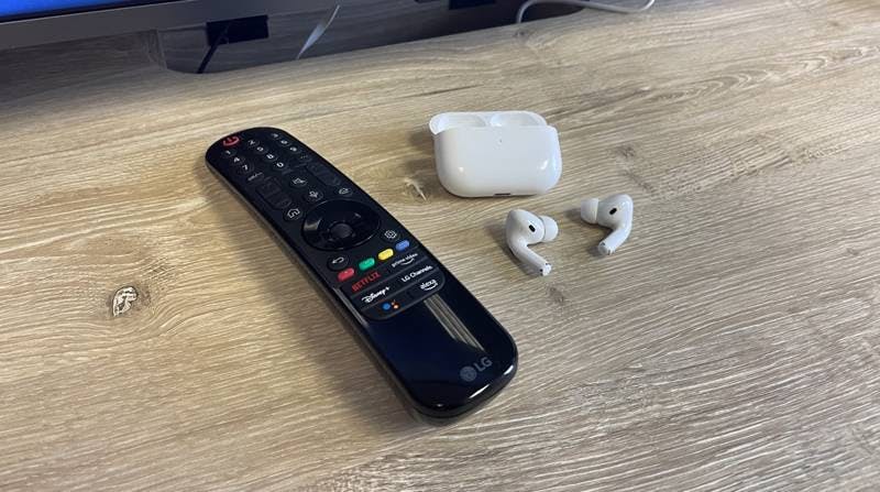 LG TV Remote with Airpods and Case Open
