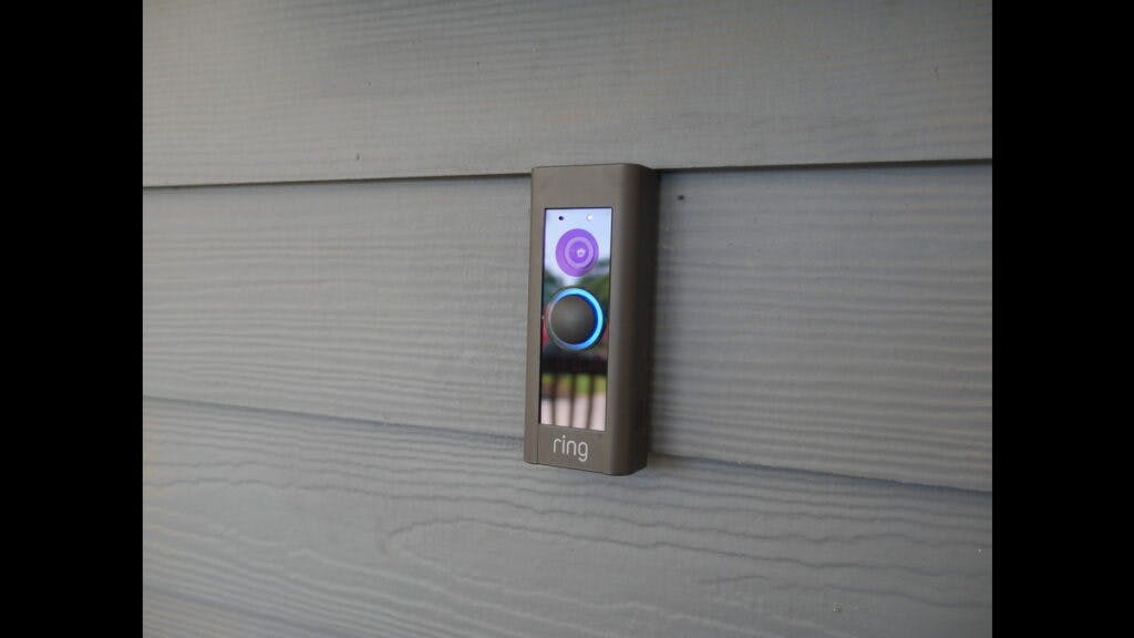 ring doorbell mounted on siding